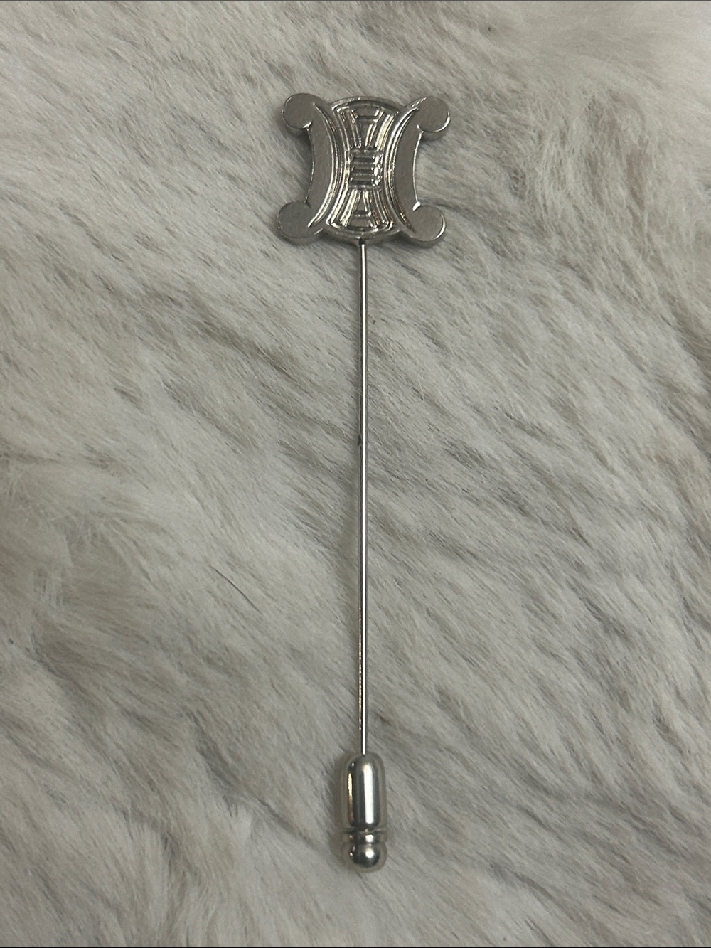 Celine silver tone Triomphe stick pin unisex
